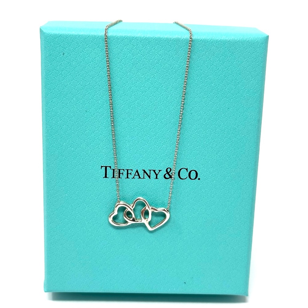 Authentic Tiffany & CO.  Triple open Hearts Pendant Necklace.